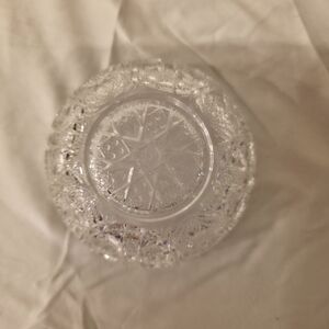 Antique American brilliant cut glass bowl with hobstar patterns.